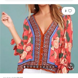 Free People Blouse with oranges and pattern